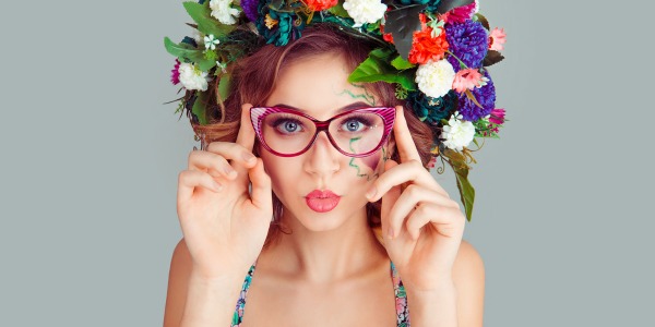 Girl wearing glasses and flowers